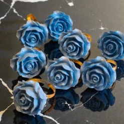 Windrose 8 Serviettenringe blaue Rose mit Glitzer